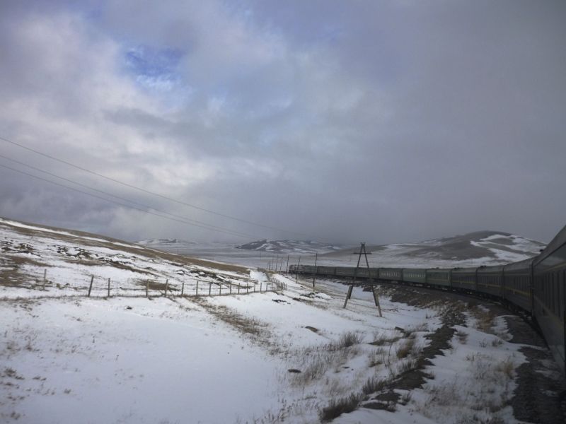 The Trans-Mongolian Express Train rounding a corner in Mongolia